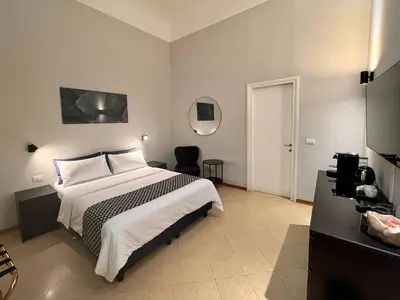 Letto o letti in una camera di Arno Boutique