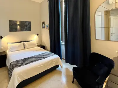 Letto o letti in una camera di Arno Boutique