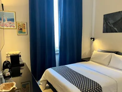 Letto o letti in una camera di Arno Boutique