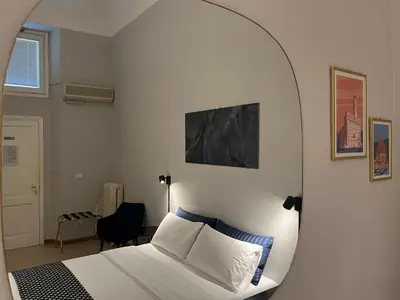 Letto o letti in una camera di Arno Boutique