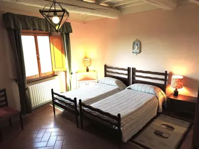 Letto o letti in una camera di Agriturismo Montereggi
