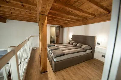Letto o letti in una camera di Sunrise Apartment by Mamo Florence