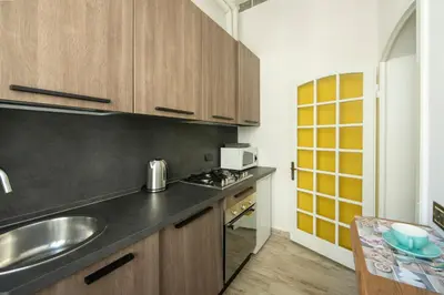 Cucina o angolo cottura di Sunrise Apartment by Mamo Florence
