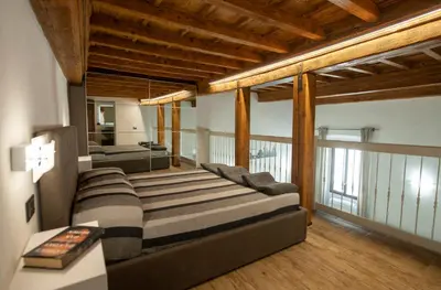 Letto o letti in una camera di Sunrise Apartment by Mamo Florence