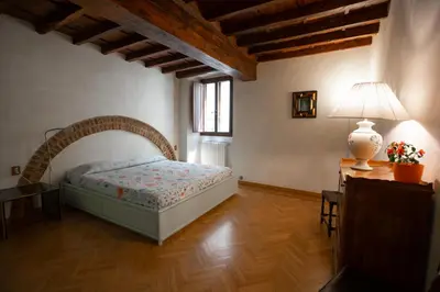 Letto o letti in una camera di Torre dei Sapiti Apartment