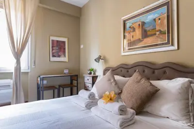 Letto o letti in una camera di PONTE VECCHIO STUDIO 2