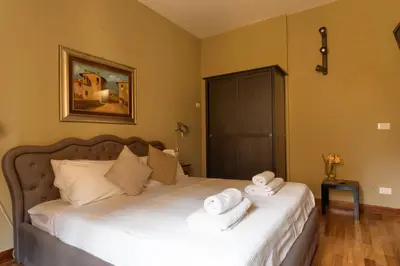 Letto o letti in una camera di PONTE VECCHIO STUDIO 2