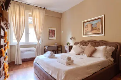 Letto o letti in una camera di PONTE VECCHIO STUDIO 2