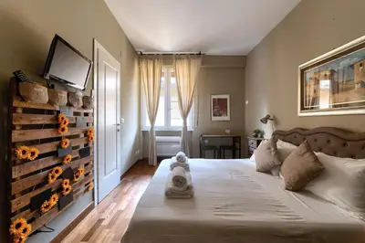 Letto o letti in una camera di PONTE VECCHIO STUDIO 2