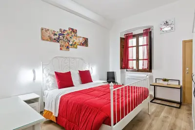 Letto o letti in una camera di GuestHost - Uffizi Gallery Cozy Flat
