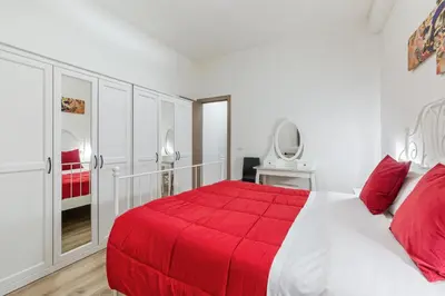 Letto o letti in una camera di GuestHost - Uffizi Gallery Cozy Flat