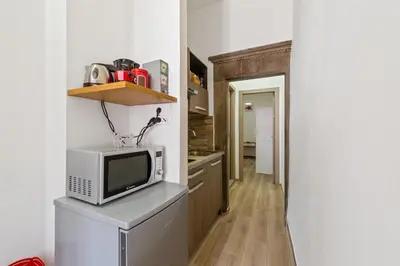 Cucina o angolo cottura di GuestHost - Uffizi Gallery Cozy Flat