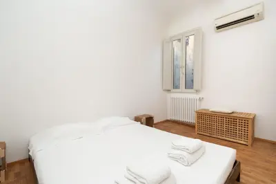 Letto o letti in una camera di Ghiberti House by Mmega