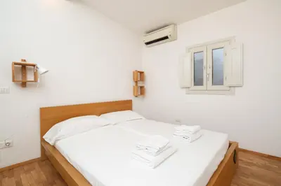 Letto o letti in una camera di Ghiberti House by Mmega