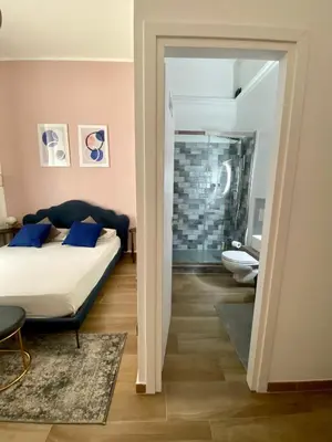 Letto o letti in una camera di B&B Monteverdi L'Arancio