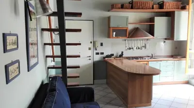 Cucina o angolo cottura di Grazioso appartamento in centro con terrazza privata