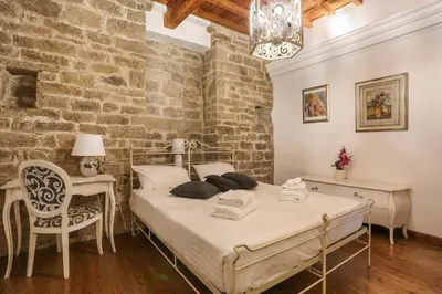 Letto o letti in una camera di Pontevecchio Stylish Apartment in Florence