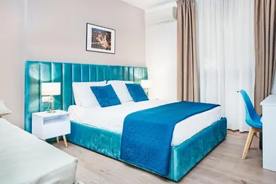 Letto o letti in una camera di Firenze Rooms Cathedral B&B