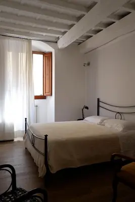 Letto o letti in una camera di A due passi da Ponte Vecchio
