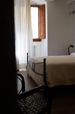 Letto o letti in una camera di A due passi da Ponte Vecchio