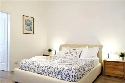 Letto o letti in una camera di Wine Apartments Florence Morellino