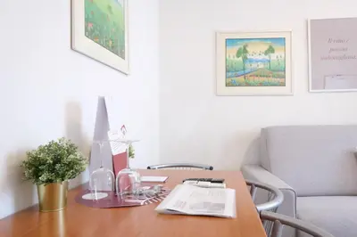 Area soggiorno di Wine Apartments Florence Morellino