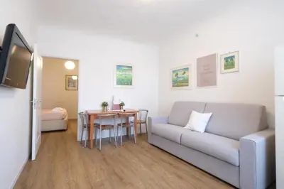 Area soggiorno di Wine Apartments Florence Morellino