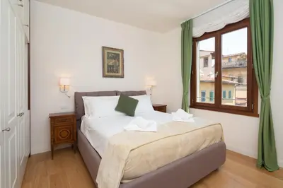 Letto o letti in una camera di San Remigio Apartment