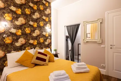Letto o letti in una camera di Smooth Mansion in Ponte Vecchio