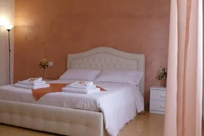 Letto o letti in una camera di CasaGiorgio a due passi dal centro storico