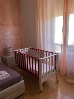 Letto o letti in una camera di CasaGiorgio a due passi dal centro storico