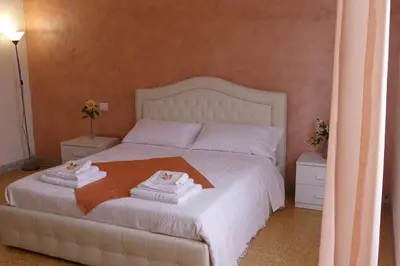 Letto o letti in una camera di CasaGiorgio a due passi dal centro storico