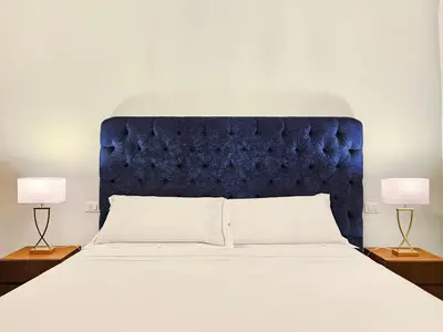 Letto o letti in una camera di SPIRIT OF FLORENCE Boutique Rooms