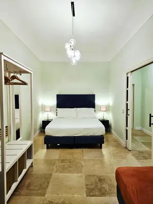 Letto o letti in una camera di SPIRIT OF FLORENCE Boutique Rooms