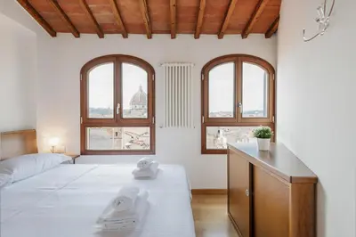Letto o letti in una camera di GuestHost - San Marco Apartment with Panoramic View