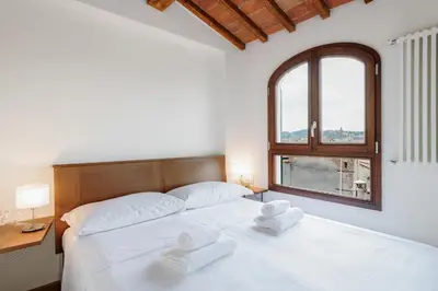 Letto o letti in una camera di GuestHost - San Marco Apartment with Panoramic View