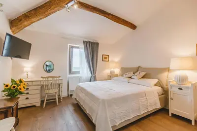 Letto o letti in una camera di Agriturismo Le Fonti