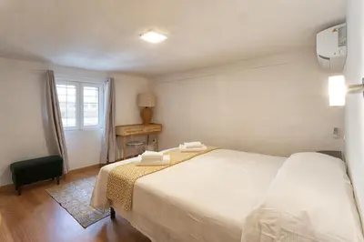 Letto o letti in una camera di Sprone House by 360Rentals