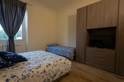 Letto o letti in una camera di Boboli Apartment by Mamo Florence