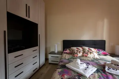 Letto o letti in una camera di Boboli Apartment by Mamo Florence