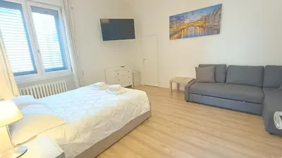 Letto o letti in una camera di Tuscan Sun Studios