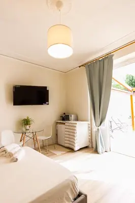Letto o letti in una camera di Tuscan Sun Studios