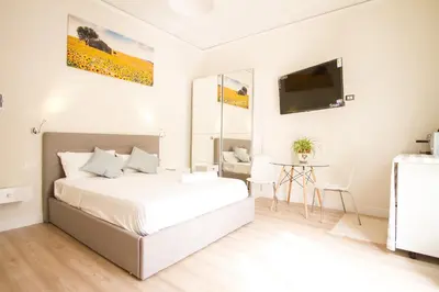 Letto o letti in una camera di Tuscan Sun Studios