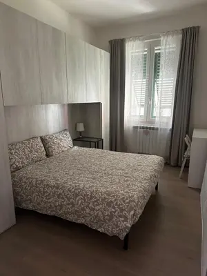 Letto o letti in una camera di Da Robi Camera con bagno privato esterno