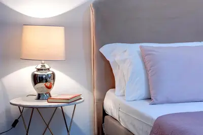 Letto o letti in una camera di Leopoldo Apartment by Mamo Florence
