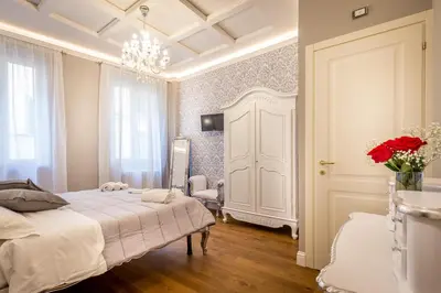 Letto o letti in una camera di Relais Twelve B&B