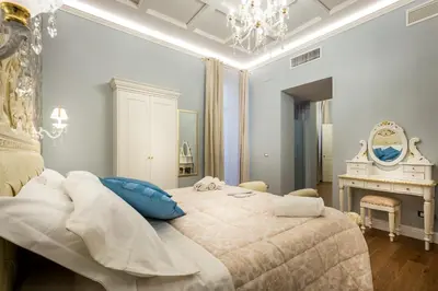 Letto o letti in una camera di Relais Twelve B&B