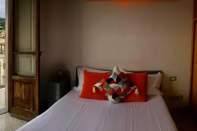Letto o letti in una camera di Sunny top floor in San Frediano