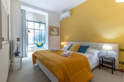 Letto o letti in una camera di Villa Lia - Apartment in Villa with private garden and Pool