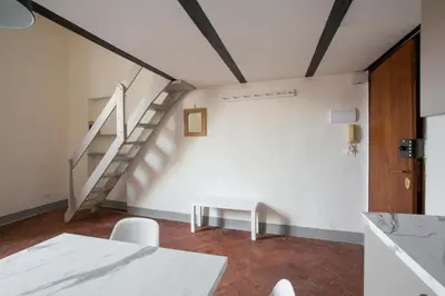 Letto o letti in una camera di Vigna Vecchia Studio - LOCAPPART